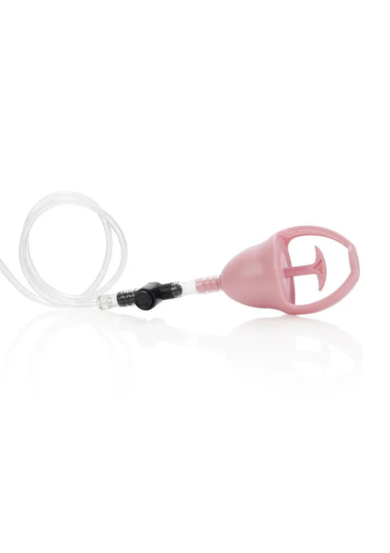 Pink butterfly-shaped clitoral pump with clear tubing and black valve on white background