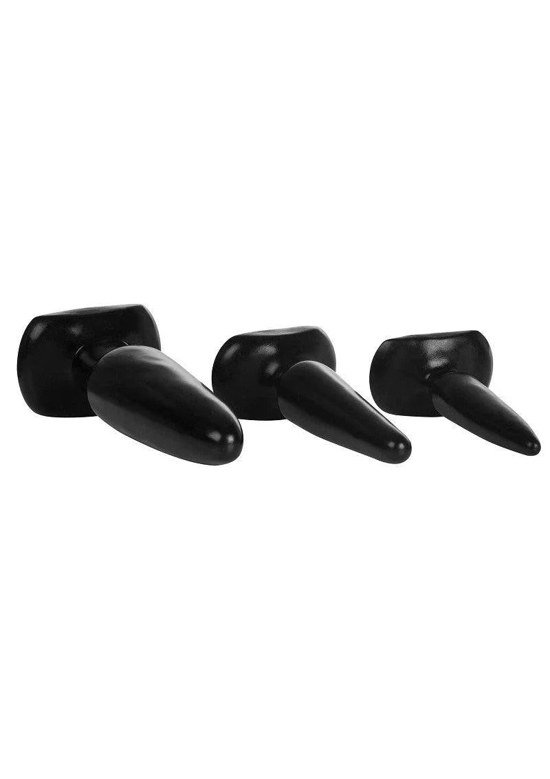 Set of three black beginner anal plugs with tapered shapes and flared bases on white background