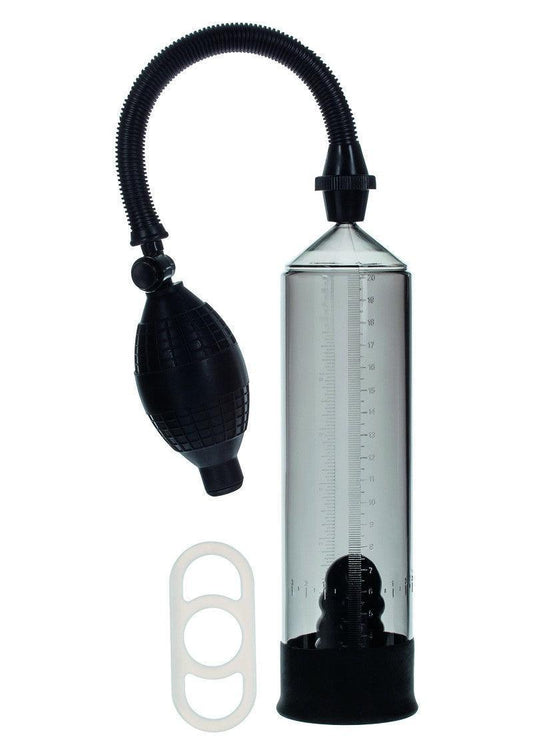 Transparent penis pump with black hand pump and flexible hose, accompanied by white silicone rings