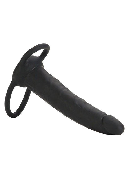 Black silicone double-ended strap-on with textured shaft and dual rings on white background