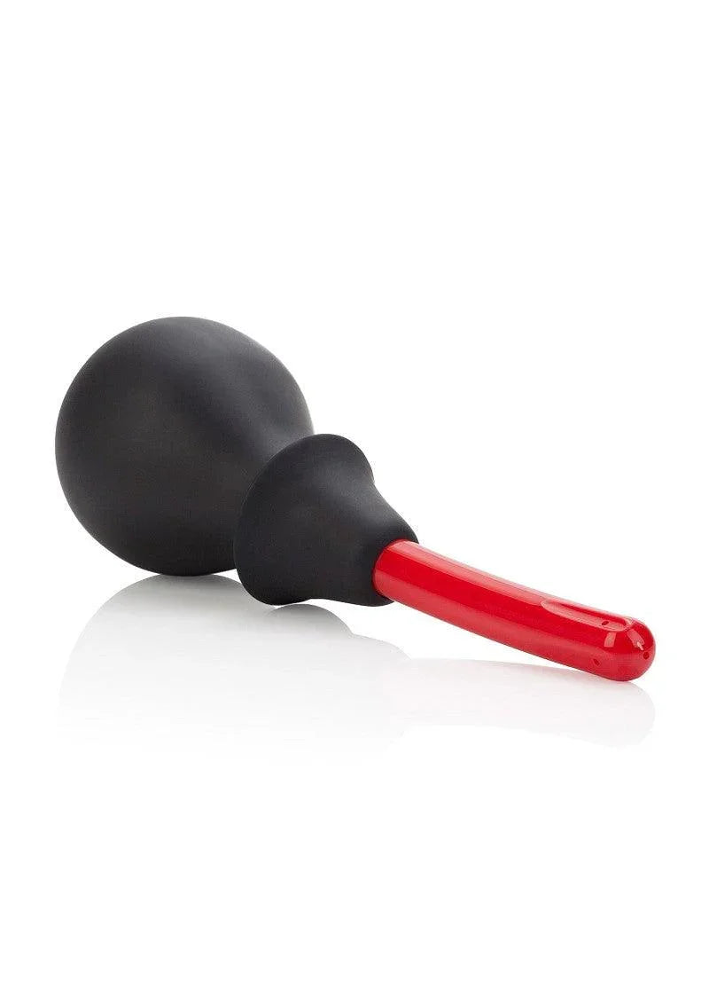 Black anal douche with a red handle on a white background, intimate hygiene tool