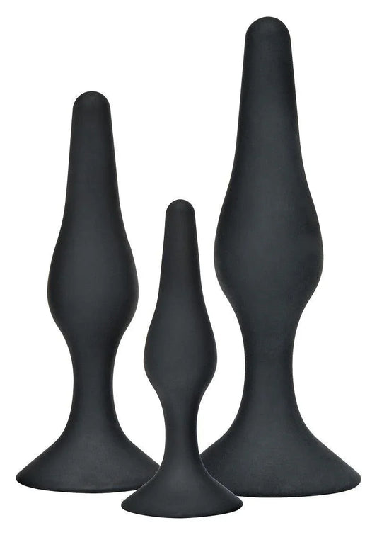 Three black silicone anal plugs of varying sizes with flared bases on white background