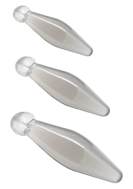 Set of three transparent glass finger rimmer anal play toys with rounded ends on white background