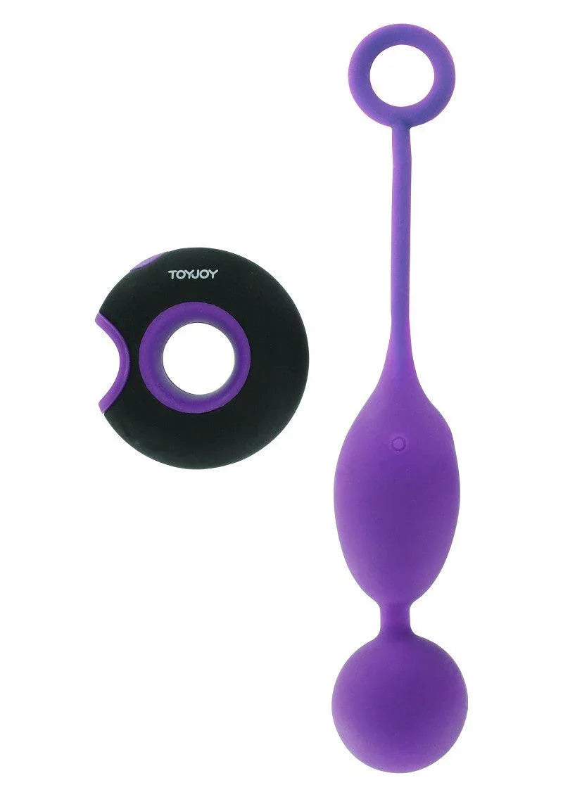 Purple silicone remote control kegel exerciser and black round remote by ToyJoy on white background