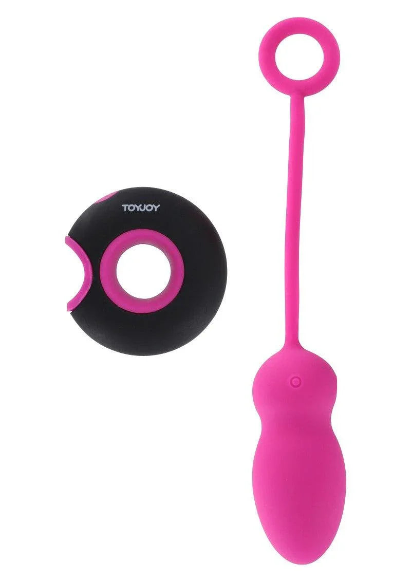 Toyjoy pink wireless stimulation vibrator and black remote control on white background